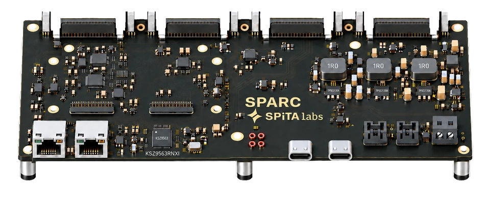 Bare main logic board concept with empty card sockets and edge-mounted USB-C connectors
